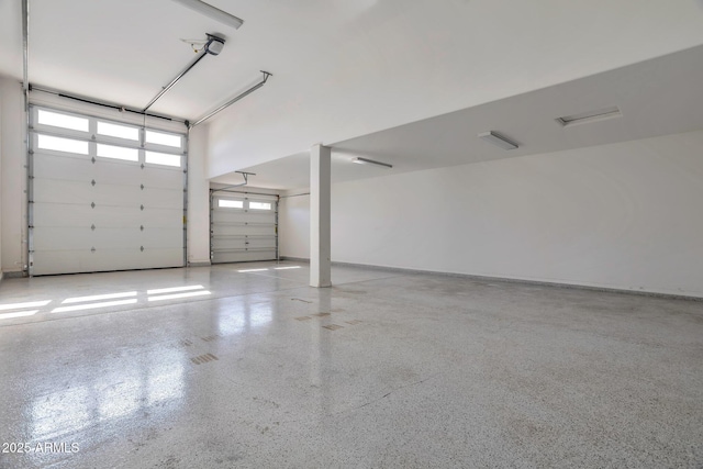 garage featuring a carport