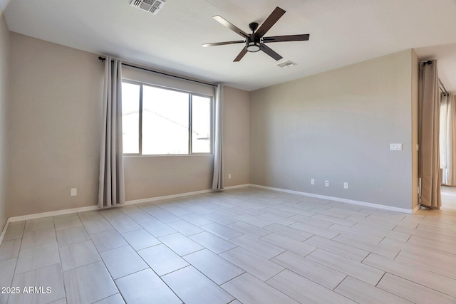 spare room featuring ceiling fan