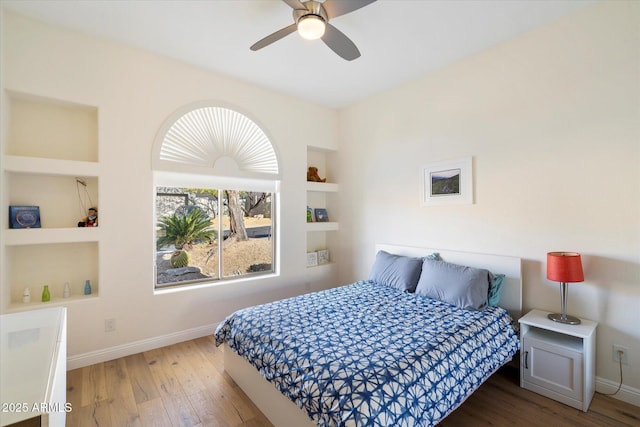 bedroom featuring ceiling fan and wood-type flooring