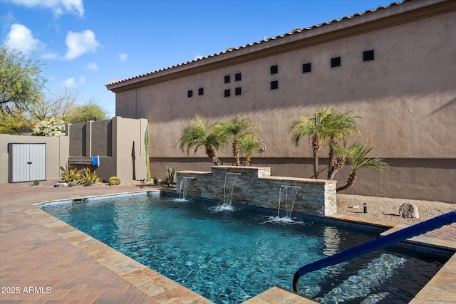 view of pool featuring pool water feature