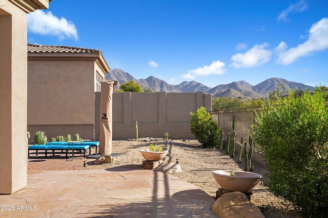 view of patio featuring a mountain view