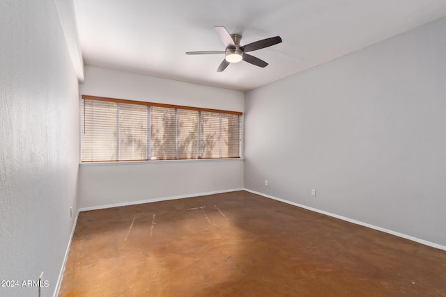 unfurnished room with ceiling fan