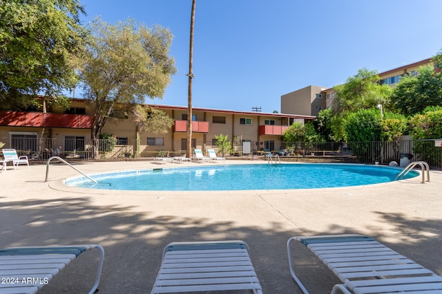 view of pool with a patio area