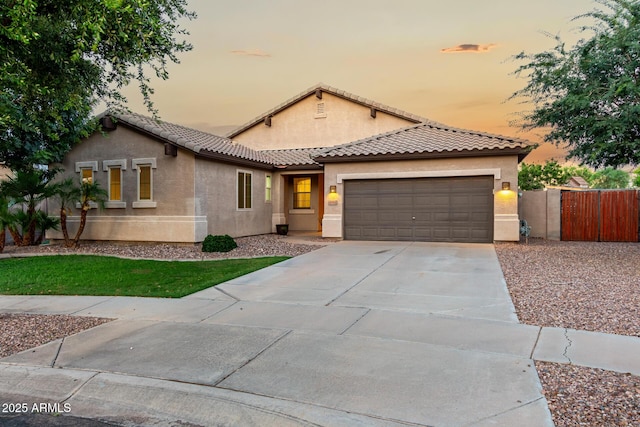 4326 E Cloudburst Ct, Gilbert, AZ 85297 - view of front of property with stucco siding, a garage, driveway, and a tile roof