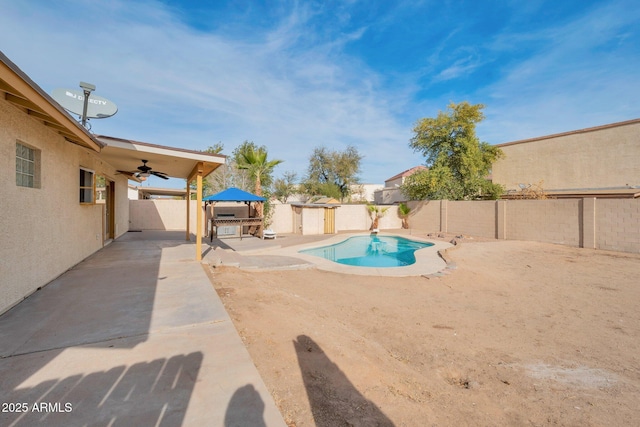 view of pool featuring a gazebo, ceiling fan, and a patio