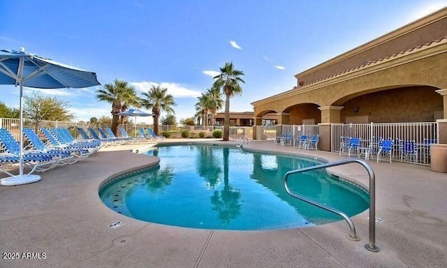 23075 W Arrow Dr, Buckeye, AZ 85326 - community pool with a patio area