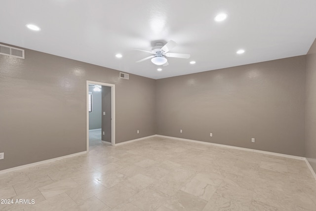 empty room featuring ceiling fan