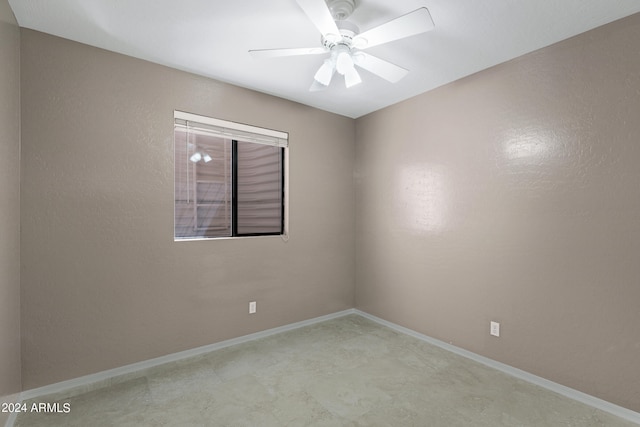 unfurnished room featuring ceiling fan