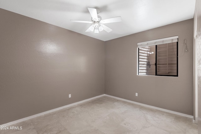 unfurnished room with ceiling fan