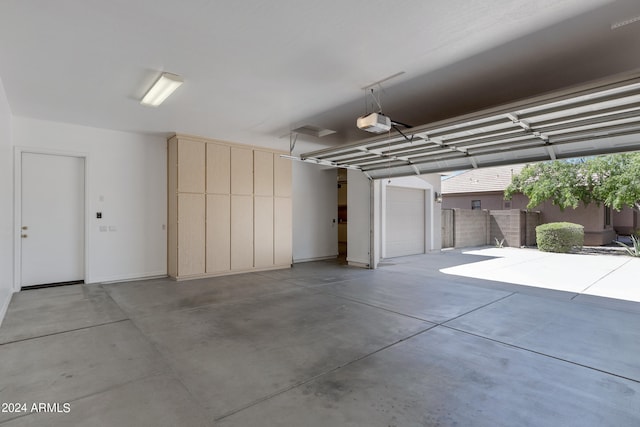 garage featuring a garage door opener