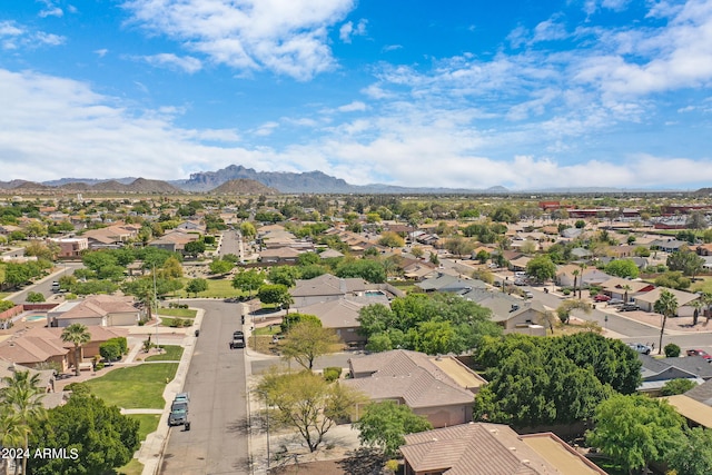 birds eye view of property featuring a mountain view