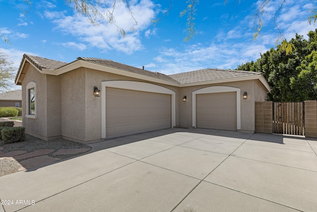 view of front of home with a garage