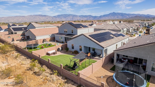 birds eye view of property with a residential view and a mountain view