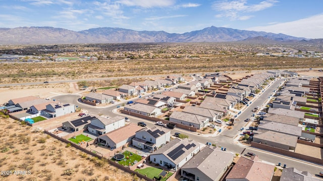 birds eye view of property with a residential view and a mountain view