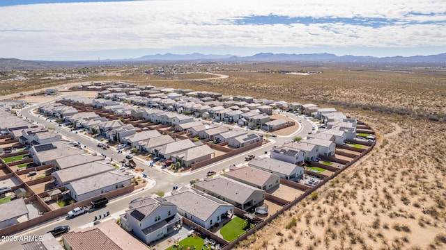 birds eye view of property with a residential view and a mountain view