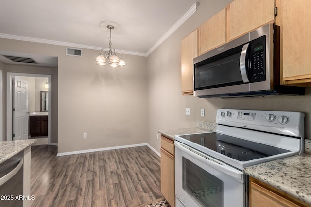 kitchen featuring appliances with stainless steel finishes, visible vents, ornamental molding, and light brown cabinetry