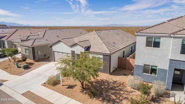 exterior space with a residential view and a mountain view