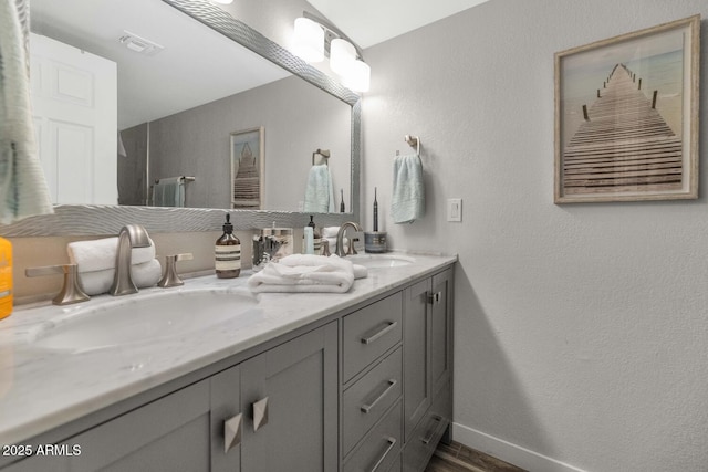 7806 N Via Del Sol, Scottsdale, AZ 85258 - full bathroom with double vanity and a textured wall