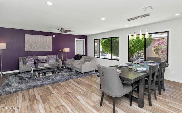 7806 N Via Del Sol, Scottsdale, AZ 85258 - dining area featuring healthy amount of natural light, a ceiling fan, wood finished floors, and recessed lighting