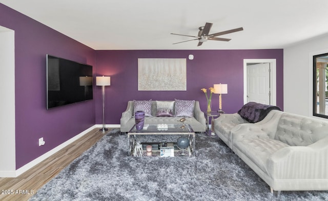 7806 N Via Del Sol, Scottsdale, AZ 85258 - living room featuring wood finished floors and a ceiling fan