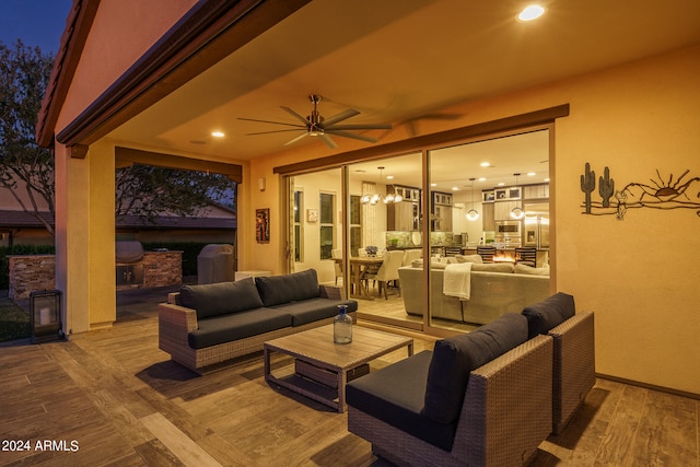 view of patio featuring ceiling fan and an outdoor living space