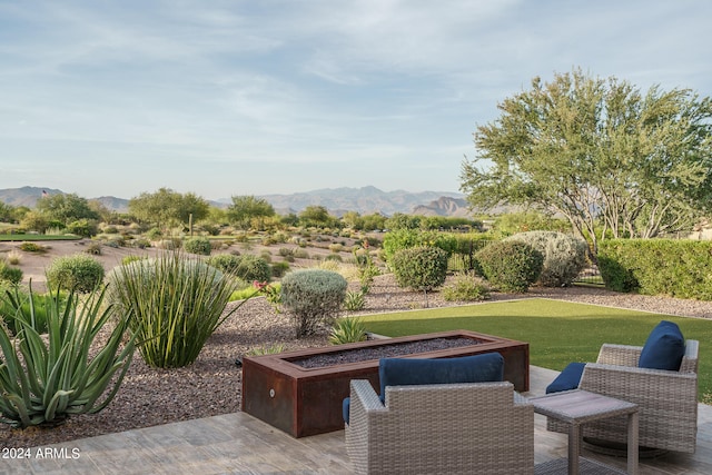 view of patio / terrace featuring a mountain view