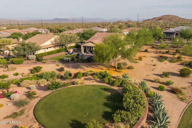 birds eye view of property featuring a mountain view