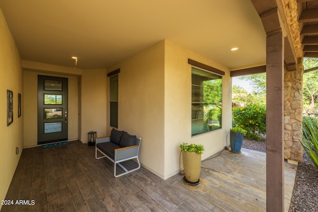 entrance to property featuring a deck