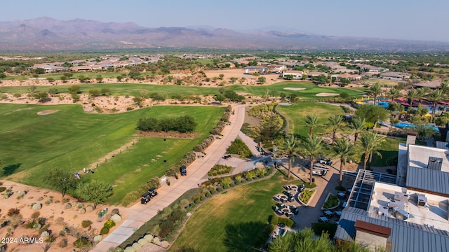 birds eye view of property with a mountain view