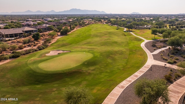 birds eye view of property featuring a mountain view