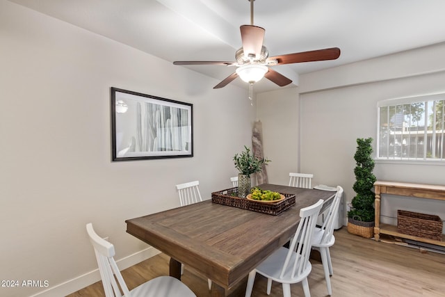 dining area featuring light hardwood / wood-style floors and ceiling fan