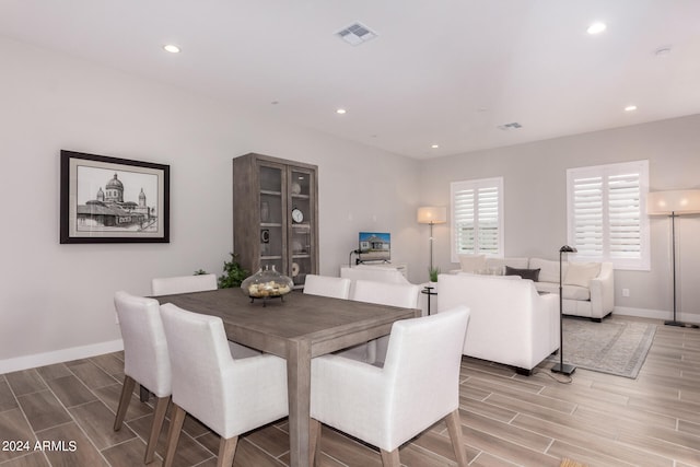 dining area with light hardwood / wood-style flooring