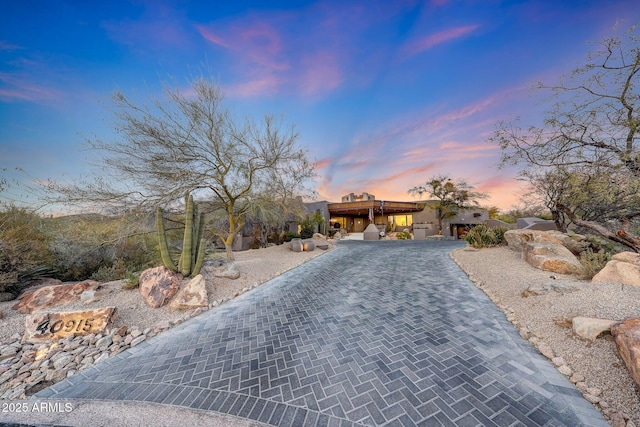 southwest-style home featuring a carport