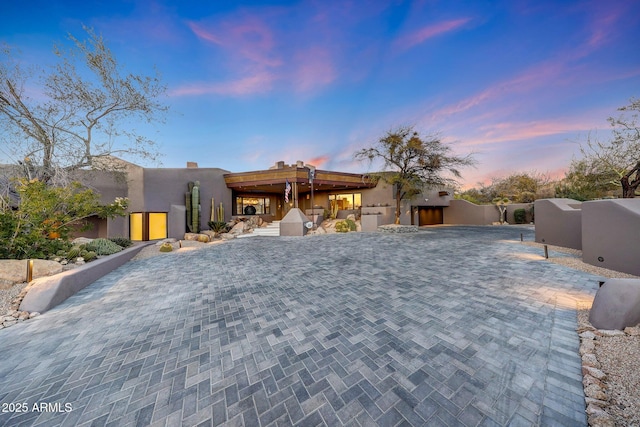 view of adobe home