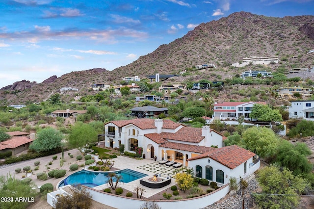 exterior space with a mountain view