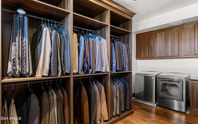 spacious closet with wood finished floors and washing machine and clothes dryer