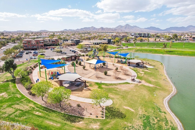 bird's eye view featuring a residential view and a water and mountain view