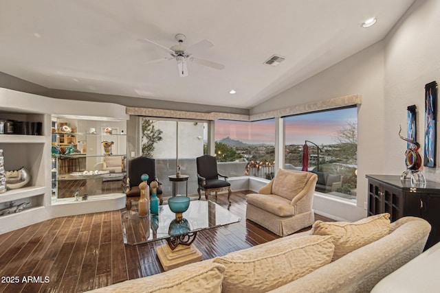 living room with recessed lighting, wood finished floors, a ceiling fan, visible vents, and vaulted ceiling