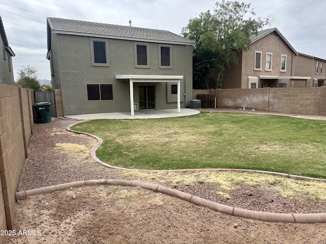 8514 S 49th Dr, Laveen, AZ 85339 - rear view of property with a patio, stucco siding, and cooling unit