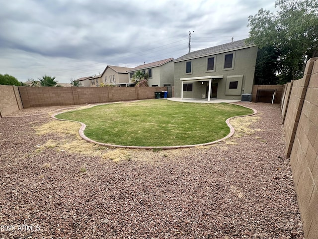 8514 S 49th Dr, Laveen, AZ 85339 - rear view of property featuring central air condition unit, a patio, and stucco siding
