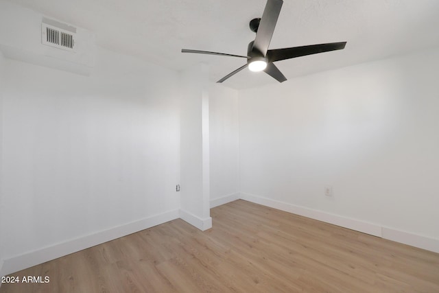 unfurnished room featuring light hardwood / wood-style flooring and ceiling fan