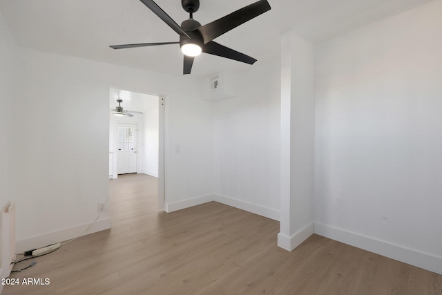 unfurnished room with light hardwood / wood-style floors and ceiling fan