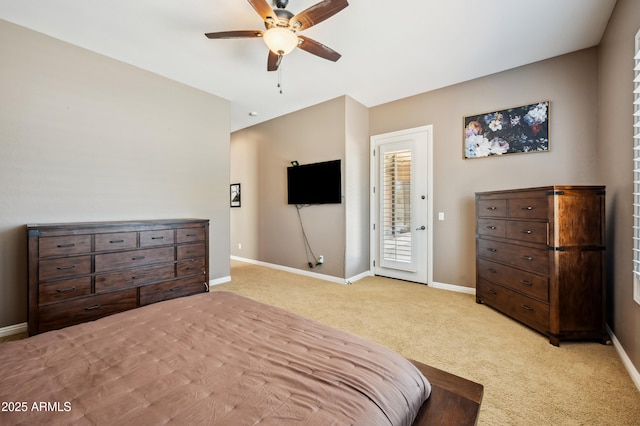 8417 W Northview Ave, Glendale, AZ 85305 - bedroom featuring light colored carpet, baseboards, access to outside, and a ceiling fan