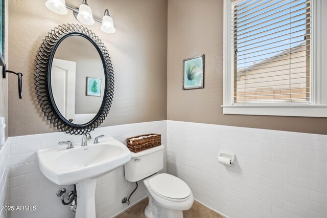 8417 W Northview Ave, Glendale, AZ 85305 - half bath with toilet, wainscoting, and tile walls