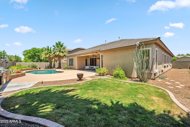 8417 W Northview Ave, Glendale, AZ 85305 - rear view of property with stucco siding, ceiling fan, a patio, and a tiled roof