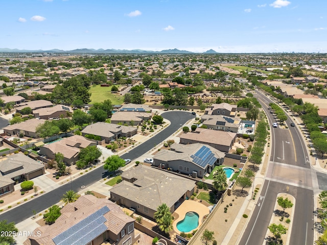 8417 W Northview Ave, Glendale, AZ 85305 - aerial perspective of suburban area with a pool and a mountain backdrop