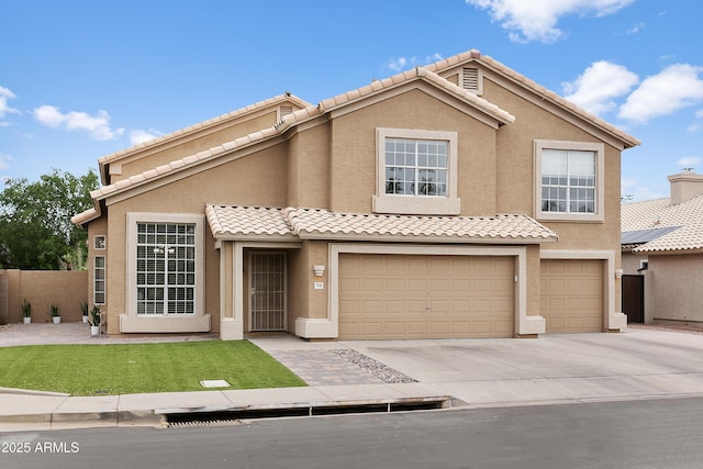 3126 W Stephens Pl, Chandler, AZ 85226 - multi unit property featuring a garage, driveway, a tile roof, and stucco siding