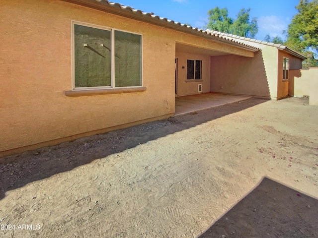 back of house featuring a patio