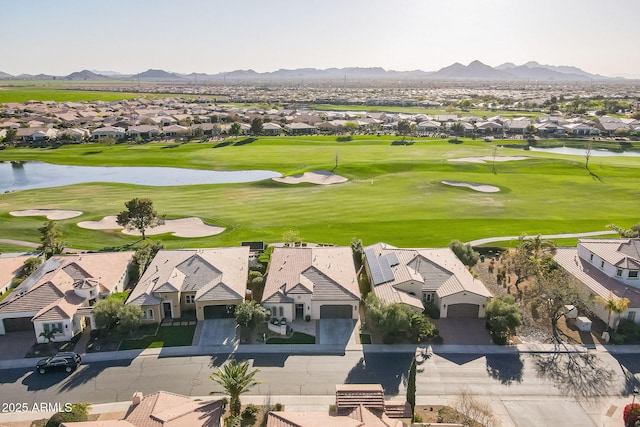 bird's eye view with a residential view, a water and mountain view, and view of golf course