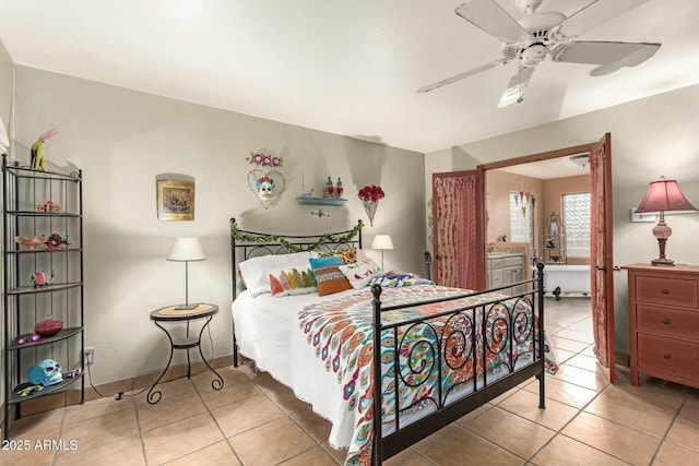 bedroom featuring tile patterned floors, a ceiling fan, and baseboards